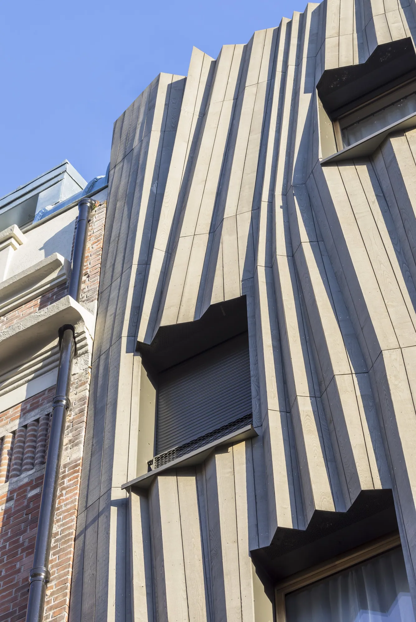 Façade de Yama Tani, bardage en bois rainuré